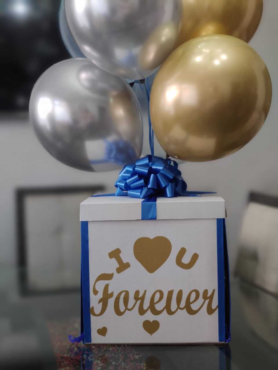 Caja sorpresa con globos